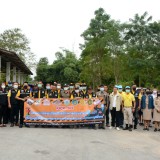 โครงการจัดระเบียบป้ายข้างทางถนนสายหลัก ๑๐๗ ปรับปรุงภูมิทัศน์ข้างทางถนนสายรองสร้างถนนสีขาวอย่างยั่งยืนแบบบูรณาการ โดยศูนย์ประสานงานเครือข่ายเฉพาะประเด็นการจัดการความปลอดภัยทางถนน (ศปง.ตำบลขับขี่ปลอดภัย)