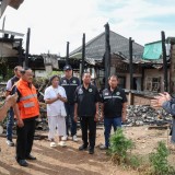 มอบเงินช่วยเหลือ ผู้ประสบอัคคีภัย ให้แก่ นางสมศรี สิทธิกิจ 